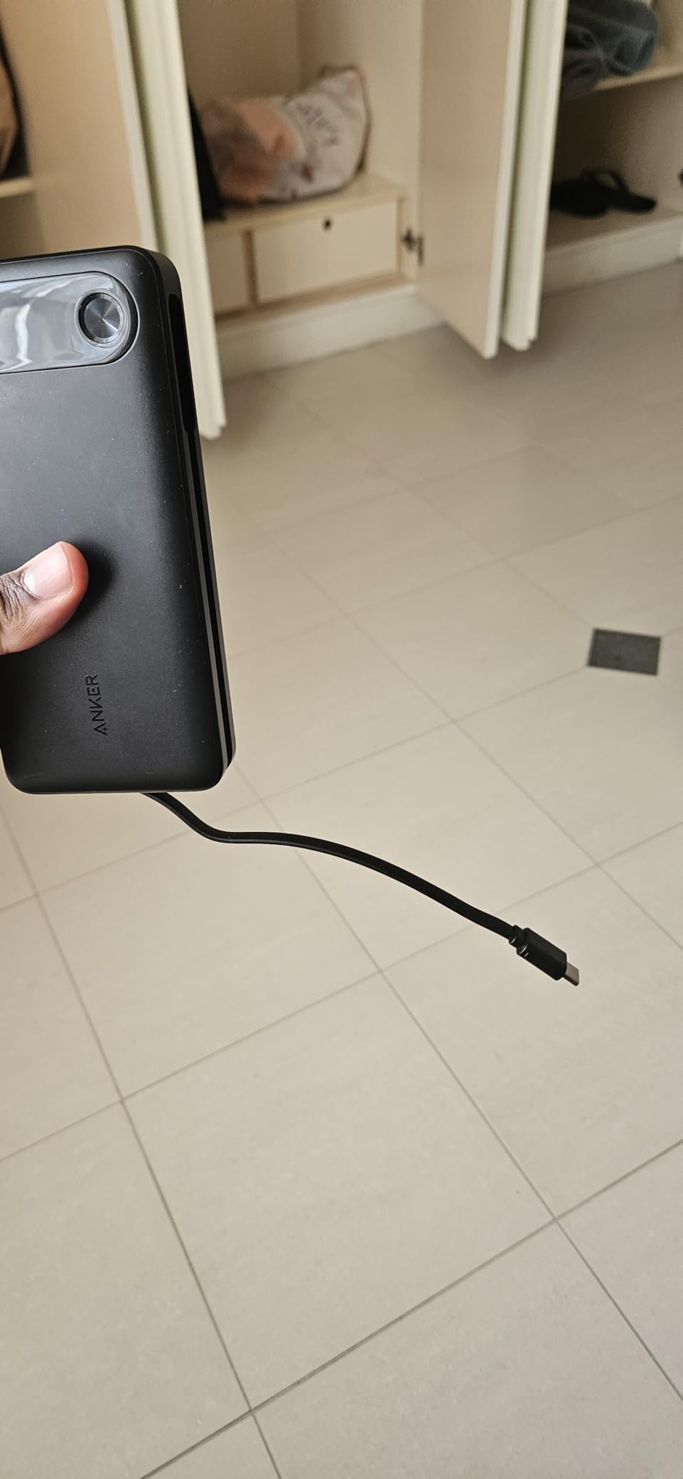 Anker Power Bank, 20,000mAh Travel Essential, Built-in USB-C Cable (Black) | 3-Port 87W Max Fast Charging Battery Pack, for MacBook, iPhone 16 / 15 Series, Samsung, Switch, and More customer photo 1