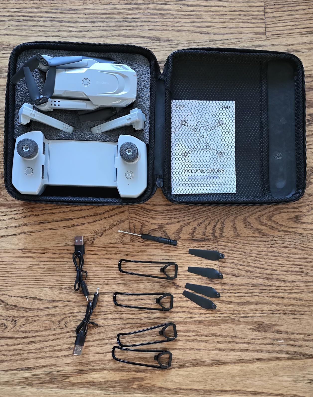 Drone with 1080P Camera - Foldable Remote Control Quadcopter with Gesture Control, 3D Flip, One Key Start, Emergency Stop, 2 Batteries, Easier to use, Toy for Adults Beginners, Grey customer photo 1