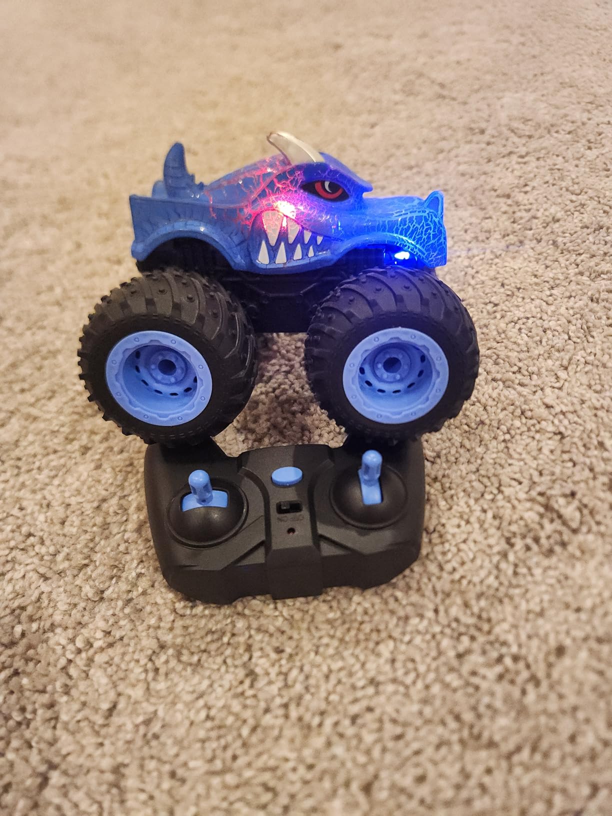 AUUGUU Remote Control Car, 2.4GHz Monster Trucks Toys with Light Spray, Birthday Gift for Kids 3 4 5 6 7 8, All Terrain RC Cars, Toddler Toys for Boys Girls 3+ Year Old customer photo 1