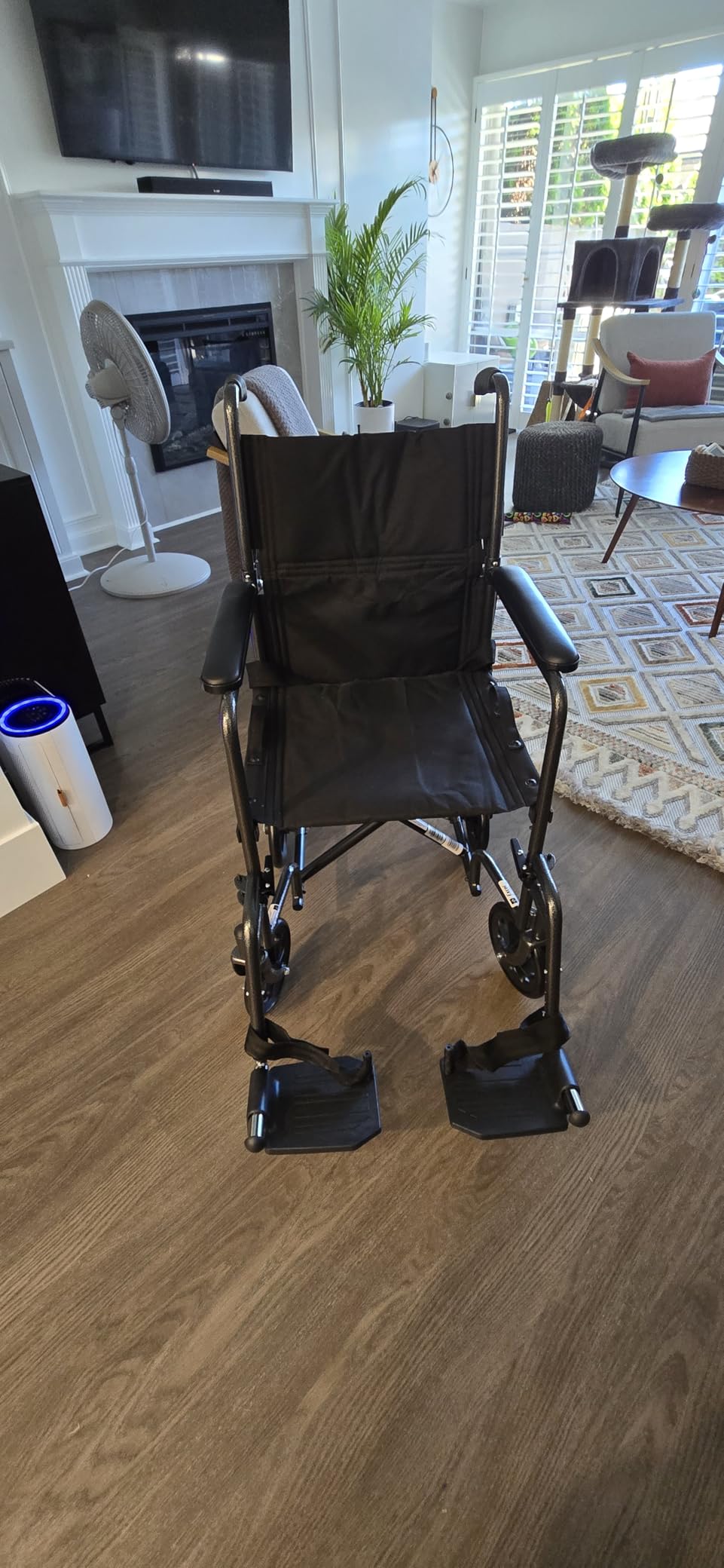 Medline Durable Folding Steel Transport Wheelchair with Swing-Away Footrests, 19-Inch Seat Width, Black Frame, Black Upholstery customer photo 1