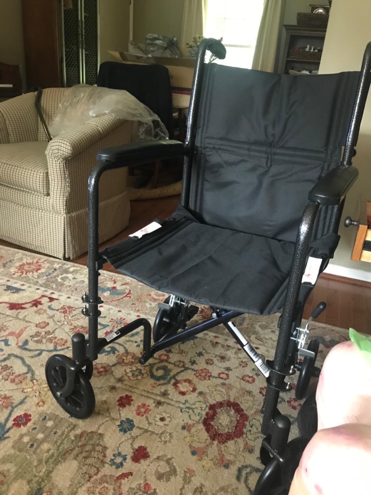 Medline Durable Folding Steel Transport Wheelchair with Swing-Away Footrests, 19-Inch Seat Width, Black Frame, Black Upholstery customer photo 2