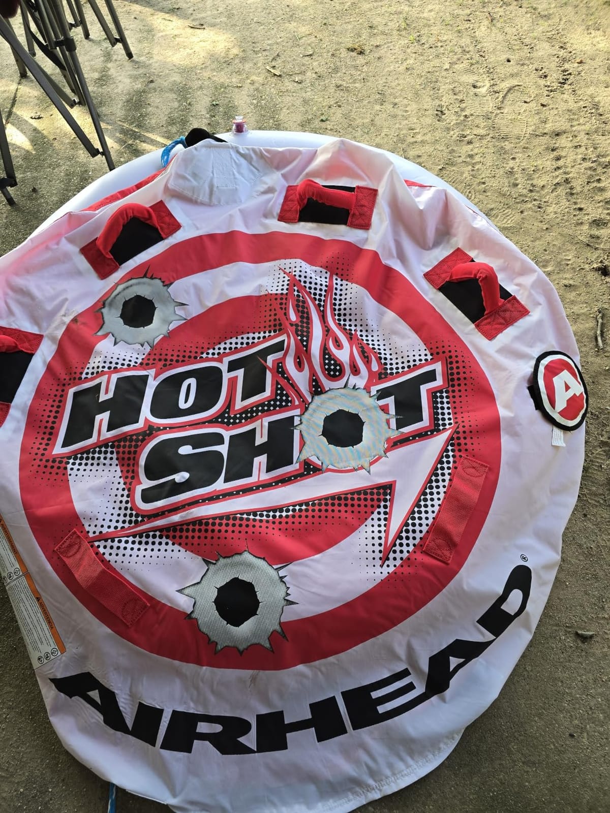 Airhead Hot Shot Towable Tube for Boating, 1 - 2 Rider Inflatable Boat Tube for Water Tubing, Round Deck for Air Time, Full Nylon Cover, Padded Handles with Neoprene Knuckle Guards, Speed Safety Valve customer photo 1