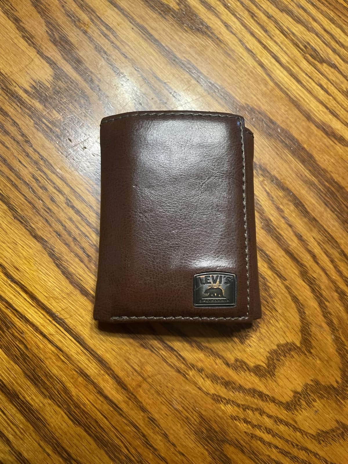 Levi's Men's Trifold Wallet-Sleek and Slim Includes Id Window and Credit Card Holder, Brown Stitch, One Size customer photo 1