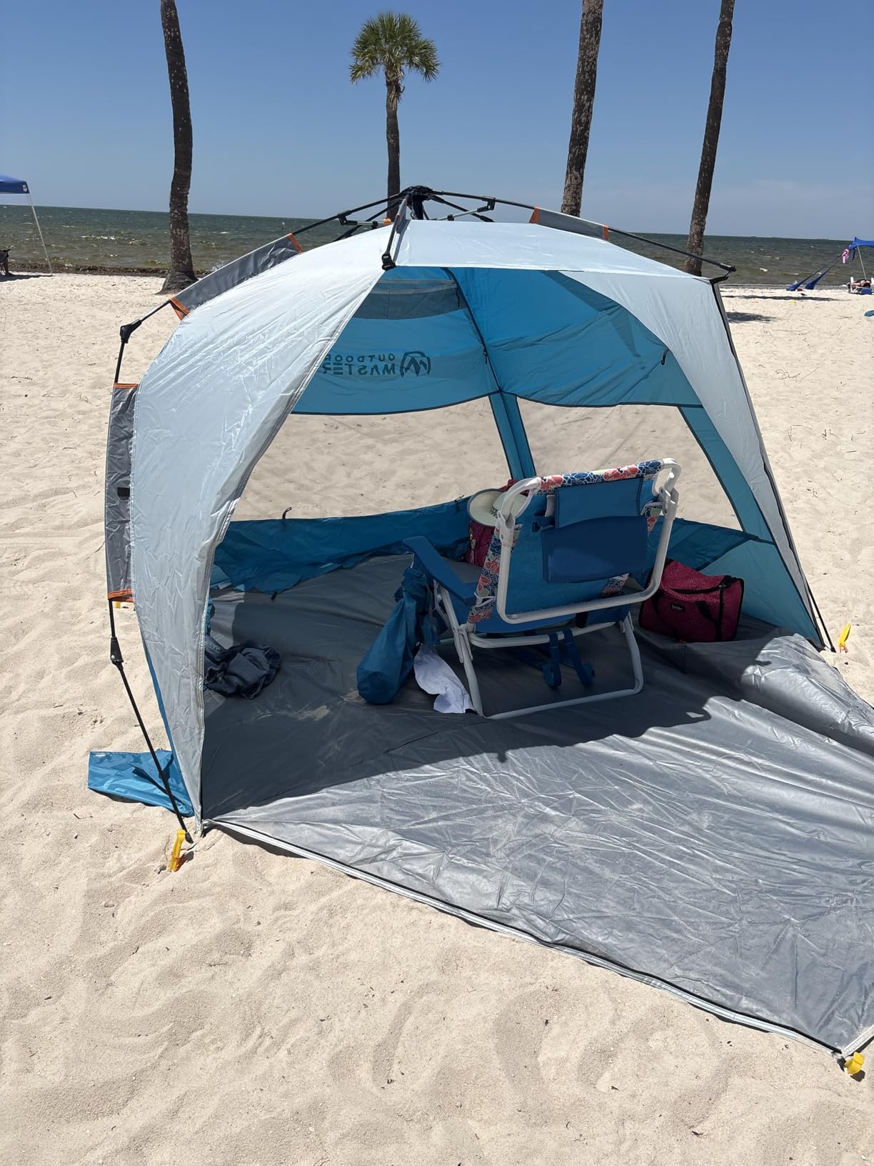 WhiteFang Deluxe Pop Up Beach Tent Sun Shade Shelter for 3-4/5-6 Person, UV Protection, Extendable Floor with 3 Ventilating Windows Plus Carrying Bag, Stakes, and Guy Lines customer photo 1