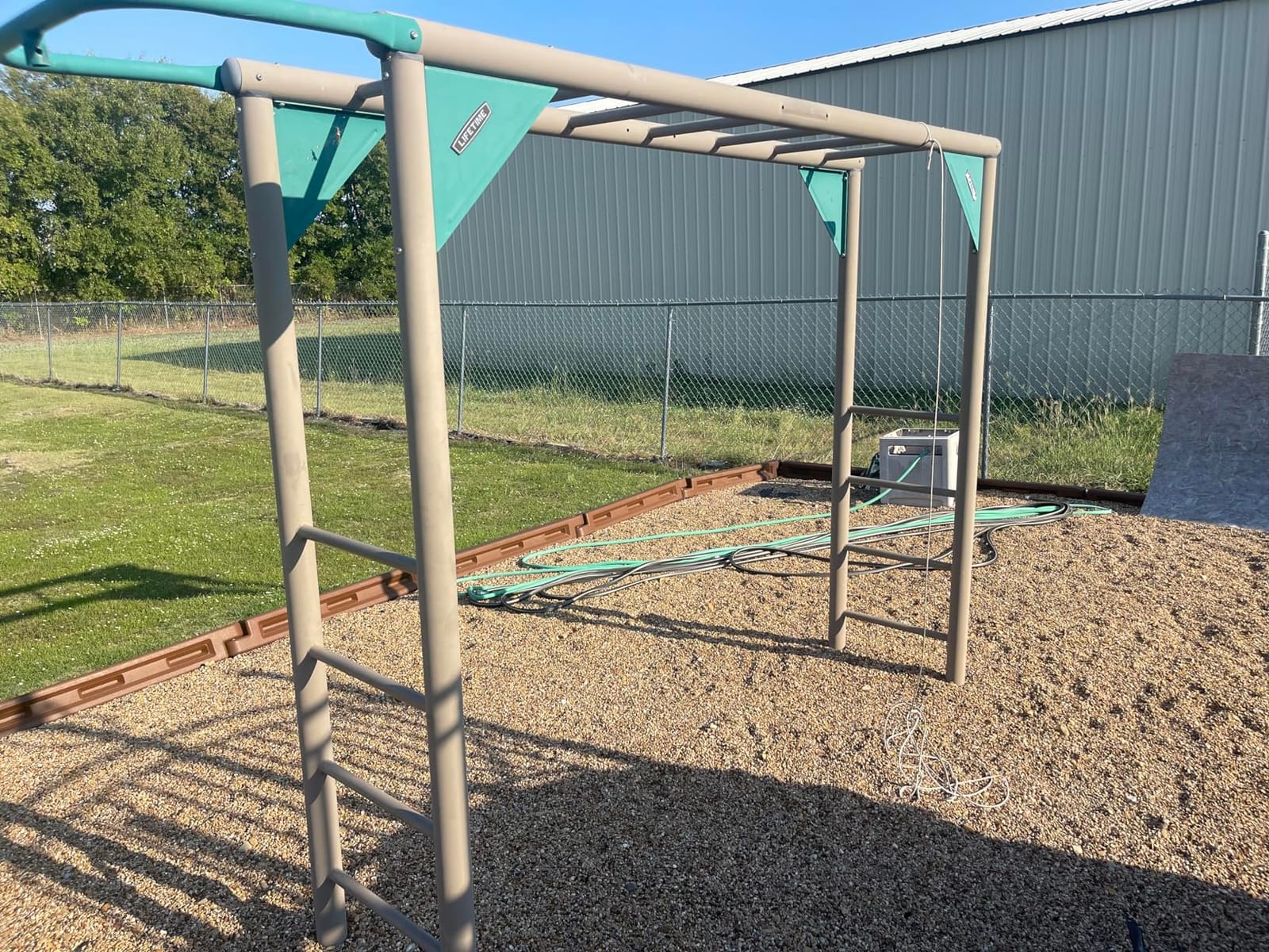 Lifetime Adventure Tower Deluxe Swing Set Playset Lifetime Adventure Tower, Covered Clubhouse, 9 ft Wavy Slide, Monkey Bars, Climbing Wall, Fireman’s Pole, Belt Swings & Trapeze customer photo 1
