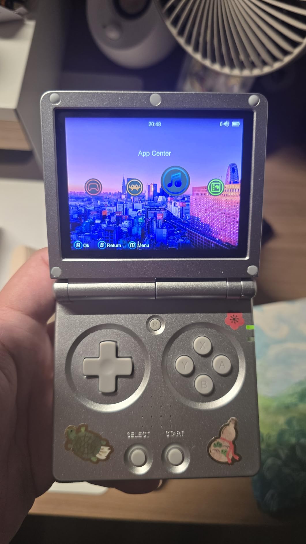 Anbernic RG35XXSP Flip Retro Handheld Game with 3.5 Inch IPS Screen Linux System Built-in 64G TF Card 5532 Games Support 5G WiFi Bluetooth TV Output(Gray) customer photo 1