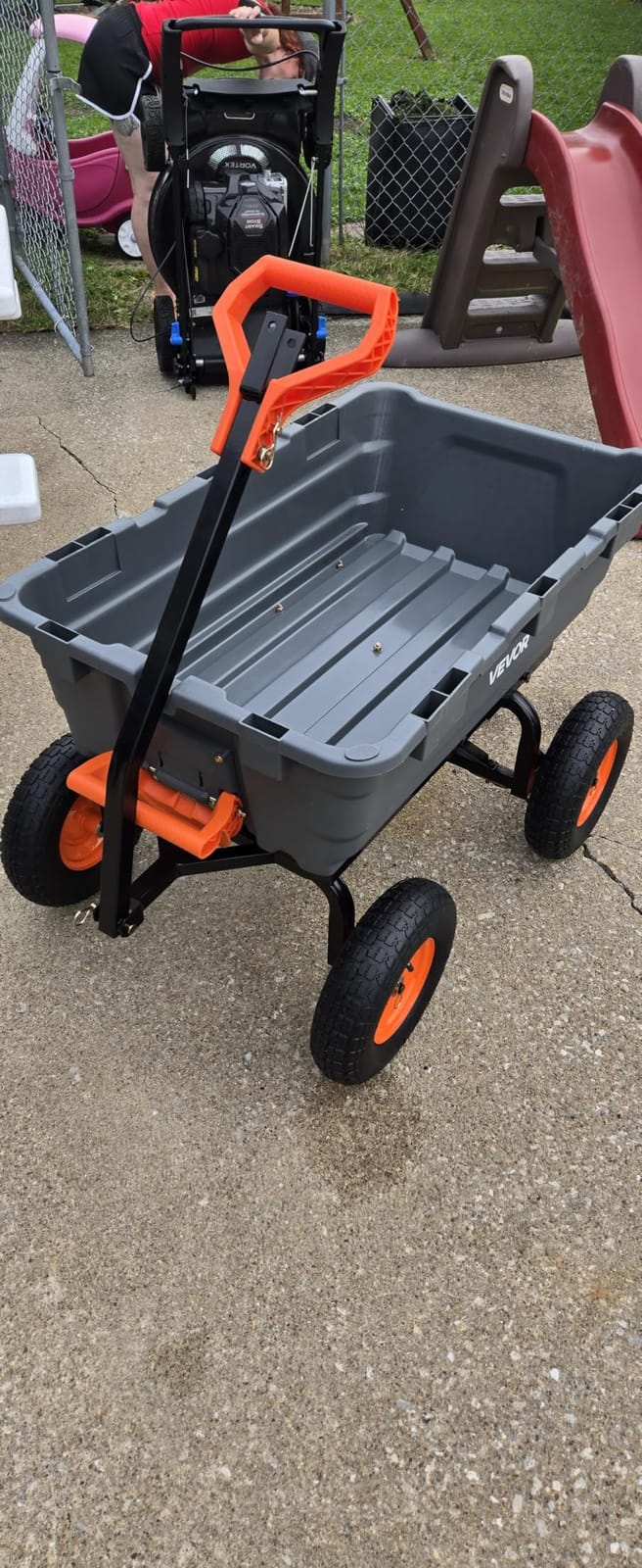 VEVOR 1500lbs Poly Garden Dump Cart Wheelbarrow Wagon with 2 in 1 Convertible Handle, Heavy Duty Yard Cart Wagon for with 13in All Terrain Wheels, Dump Trailer Tow Behind for Lawn Mower Tractor customer photo 2